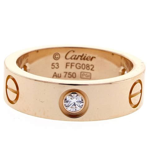 cartier 750 love ring logo.